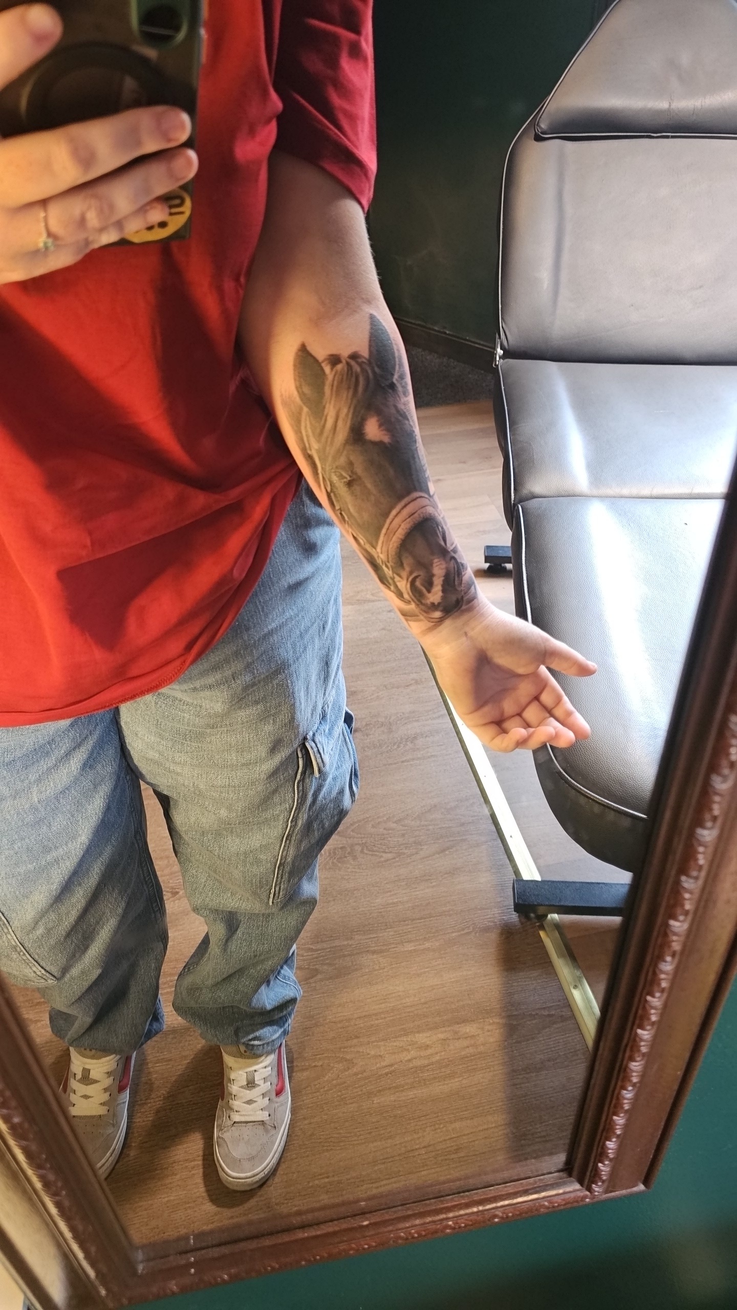 Horse and clock arm tattoo photographed by Kayleigh Furby