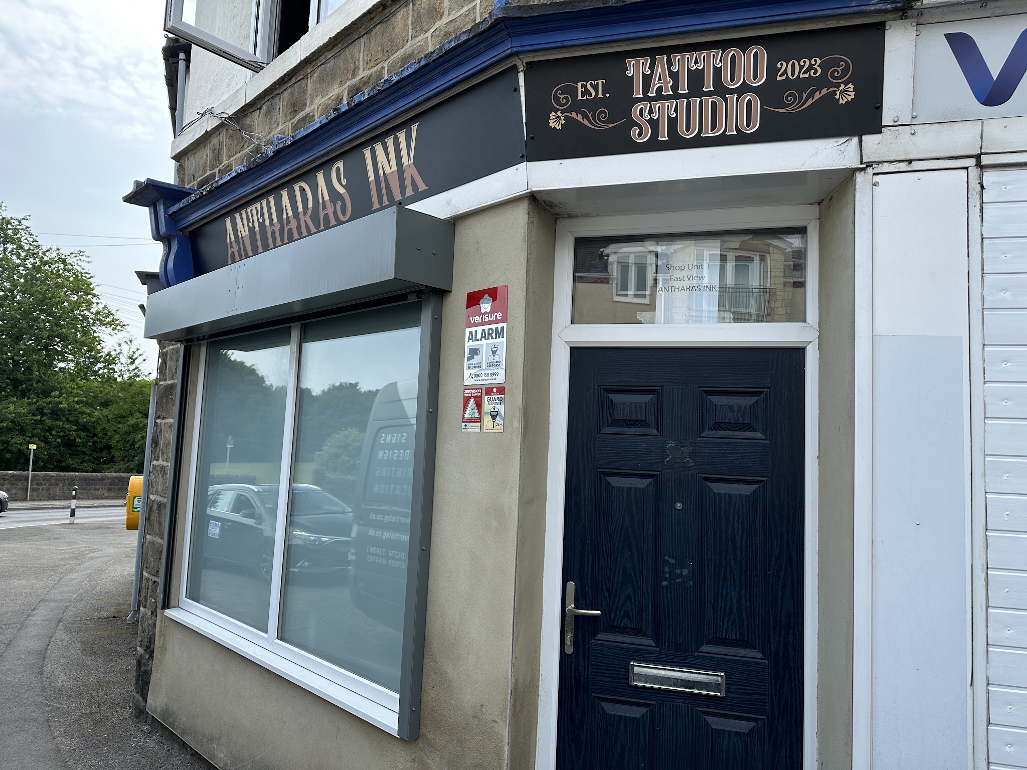 The Antharas Ink studio entrance and named sign on Broadgate Lane