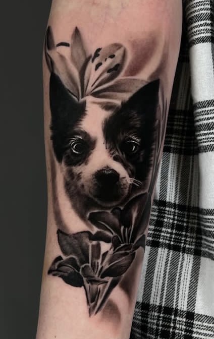 Dog portrait and flowers tattoo photographed by Amy Martin